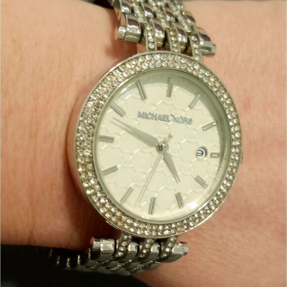 Michael Kors watch with a large round white face